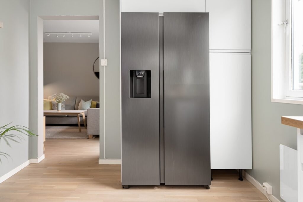Modern household refrigerator in a bright kitchen