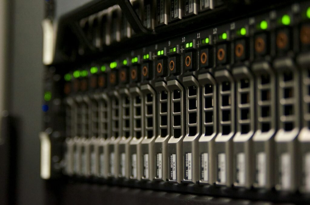Server rack with green status lights representing equipment protected by UPS battery backup